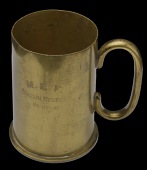 Tankard, made from a brass shell case, 88mm. max. dia, 116mm. high,, base of shell/tankard stamped, ‘Rh.M.F.1914...