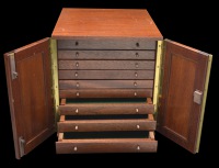 Collector’s Cabinet, 310 x 293 x 313mm., wooden cabinet with nine undivided drawers, eight with a depth of 20mm.,...