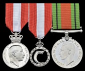 A Danish group of three medals

Denmark, King Christian’s Liberation Medal 1940-45 (Pro Dania Medal), silver, in...