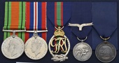 Five: Dental Surgeon Commander W. R. Young, Royal Naval Volunteer Reserve

Defence and War Medals, unnamed; Royal...
