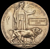 A Memorial Plaque awarded in remembrance of Gunner G. W. Baker, Canadian Field Artillery, who was killed in an...