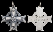 A Canadian Memorial Cross awarded in remembrance of Sapper R. R. Drake, Canadian Engineers, who died of wounds on...