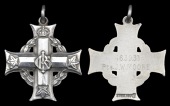 A Canadian Memorial Cross awarded in remembrance of Private J. W. Moore, 47th (Western Ontario) Battalion, who was...