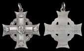 A Canadian Memorial Cross awarded in remembrance of Private R. Middlemore, 50th (Calgary) Battalion, who, having...