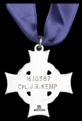 A Canadian Memorial Cross awarded in remembrance of Corporal J. R. Kemp, Royal Canadian Infantry Corps

Canadian...