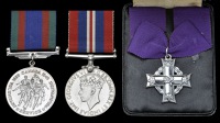Three: Lance-Corporal H. J. Mitchell, Royal Canadian Ordnance Corps. late Dufferin & Haldimand Rifles of...