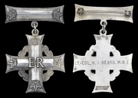 A Canadian Memorial Cross issued in remembrance of Lieutenant-Colonel H. J. Beard, M.B.E., Canadian Army Pay Corps,...