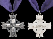 A New Zealand Memorial Cross issued in remembrance of Fireman and Trimmer E. Slane, Merchant Navy, who lost his life...