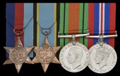 Family group:

Four: Flying Officer R. Burrell, Royal Air Force Volunteer Reserve, who was killed in action in a...