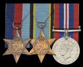 Family group:

Three: Pilot Officer P. R. Owen, Royal Air Force Volunteer Reserve, who was killed in a collision...