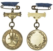 Medals, Trinidad, The Trinidad Guardian, a silver-gilt award medal for 20 years’ service by A. Clark & Co, winged...