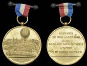 FRANCE, Henri Giffard’s Balloon Ascent over Paris, 1878, a gilt-bronze medal by C. Trotin, balloon over a view of...
