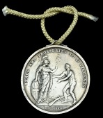 Carib War 1773, silver, cast and chased as usual, fitted with small loop for suspension, somewhat polished,...