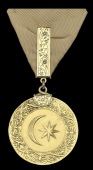 Sultan’s Medal for Egypt 1801, 4th Class, gold, 36mm., fitted with engraved gold clasp and large engraved loop for...