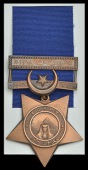 Khedive’s Star, undated, with Tokar clasp, unnamed, cleaned resulting in a ‘coppery’ finish, very fine 	 £120-160