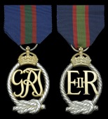 Royal Naval Volunteer Reserve Decoration (2), G.VI.R., 1st issue, undated; another, E.II.R., reverse officially...
