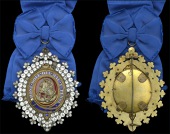 ‘St. George’ Society Badge, an oval badge, 85 x 60mm., gilt and enamel, resembling the badge of the Garter...