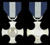 Distinguished Service Cross,  E.II.R., a trial striking and specimen by Spink & Son, hallmarks for London 1953, and...