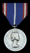 Royal Victorian Medal, E.II.R., silver, unnamed as issued, in its Royal Mint case of issue, with riband for foreign...