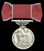 A Second World War B.E.M. awarded to Mrs E. A. Gay, an Assistant Quarter-Master of the Birmingham Branch of the...
