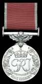 A Second World War B.E.M. awarded to A. E. Grossmith, an Inspector of Stores at H.M. Naval Victualling Depot,...