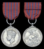 A rare post-war G.M. awarded to Lieutenant W. J. Roberts, Federation of Malaya Police Force, for his gallantry...