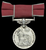 A post-war B.E.M. awarded to Miss V. M. Emms, a Drawing Office Assistant at the National Physical Laboratory in the...