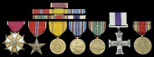 A Legion of Merit group of seven representative of those named to Acting Major Rudolf Barlow, 1st Battalion 1st...