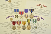 A Vietnam Distinguished Flying Cross/Bronze Star/Air Medal group of nine awarded to Warrant Officer Jerrold S....