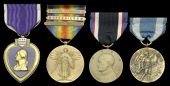 A Great War Purple Heart group of four named to Private Hiram D. Tiffany, 108th Infantry Regiment, wounded in...
