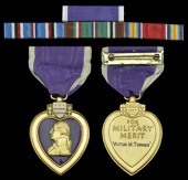 U.S.A., Purple Heart, enamelled, reverse machine engraved, ‘Victor M. Torres’, slot brooch, good very fine	...