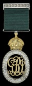 Colonial Auxiliary Forces Officers’ Decoration, G.V.R., unnamed, complete with brooch bar, good very fine	 £100-150