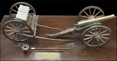 Model of a Nine Pounder Waterloo Cannon, the cannon complete with a well formed brass barrel and iron bound wheels...
