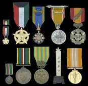 Kuwait, Liberation Medal, 2nd Class, gilt and enamel; together with a dress miniature medal and miniature riband...