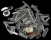 Fitments: a large quantity of silver and other metal ribbon buckles, clasps, brooch, slip and top bars, riband bars,...