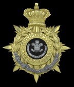 The Welsh Regiment Officer’s Helmet Plate c. 1882 - 1901, a fine quality example being a crowned eight pointed...