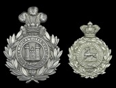 1st Glamorgan Rifle Volunteer Corps Head Dress Badge and Pouch Badge, the first in plated die stamped white metal...