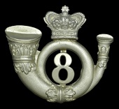 Glamorgan Rifle Volunteer Corps 8th (Mountain Ash) Company Shako Badge, in die stamped white metal, a large coiled...