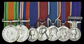 An R.V.M. group of seven awarded to Mr. C. Oulton, Palace Steward, Buckingham Palace

Defence and War Medals...