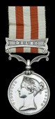 Indian Mutiny 1857-59, 1 clasp, Delhi (Gunner John Donnovan 2d. Co. 4th Bl. Arty.) officially engraved naming,...