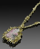 An 18ct two colour gold mounted crystal set pendant, on matching long chain by Gilian Packard, 1967, the...