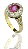 A Victorian ruby and diamond cluster ring, the oval mixed-cut ruby within a cluster surround of old brilliant-cut...
