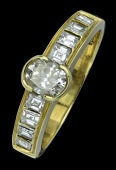 A diamond set ring, the central oval-cut diamond in raised split collet setting, between shoulder channel set with...
