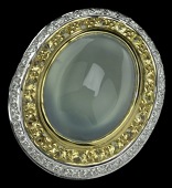 A yellow and white diamond and chrysoprase dress ring, the oval cabochon green chrysoprase within a double cluster...