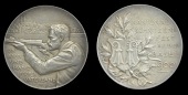 BASEL, Kantonalschützenfest beider Basel, 1900, a silver medal by H. Frei, arms on sprig of oak, rev. rifleman...