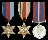 Three: Boy 1st Class R. Rawcliffe, Royal Navy, who was killed in action when H.M.S. Gloucester was sunk during the...