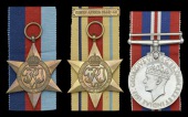 Three: Engine Room Artificer 4th Class E. G. Hunt, Royal Navy, who was killed in action in the Mediterranean during...