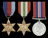 Three: Apprentice P. K. Green, Merchant Navy, who was killed in action when the cargo ship S.S. Testbank, while...