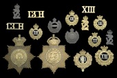 13th Hussars Insignia, a small selection of good quality items comprising a die stamped gilded metal pouch badge in...
