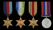 Four: Stoker 1st Class J. Jackson, Royal Navy, who was killed in action when H.M.S. Galatea was torpedoed by the...